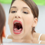 what causes sore dry or scratchy throat